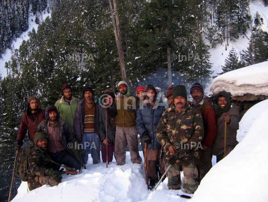 ARMY RESCUES 11 SNOW TRAPPED WORKERS OF PUBLIC HEALTH DEPARTMENM
