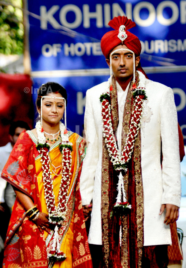 cricketer Ankeet Chavan with his wife Neha Sambhareon