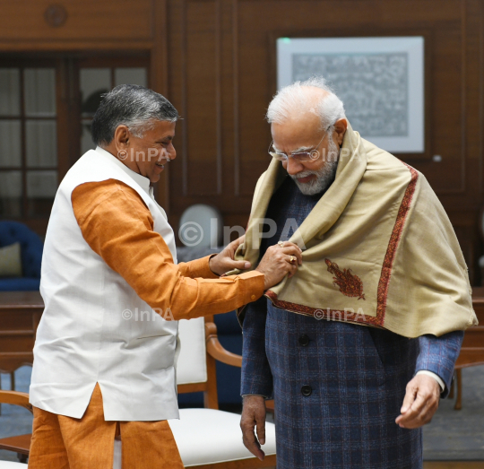 Dharmveer Prajapati with Narendra Modi 