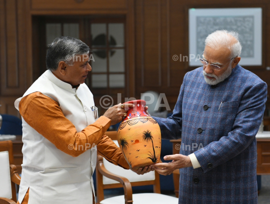 Dharmveer Prajapati with Narendra Modi 