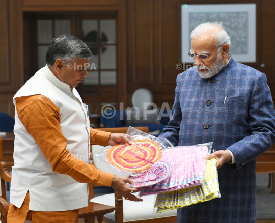 Dharmveer Prajapati with Narendra Modi 