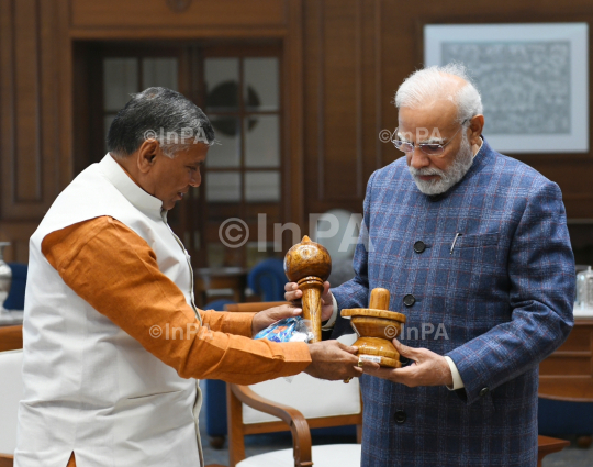 Dharmveer Prajapati with Narendra Modi 