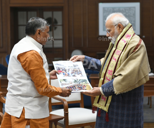 Dharmveer Prajapati with Narendra Modi 