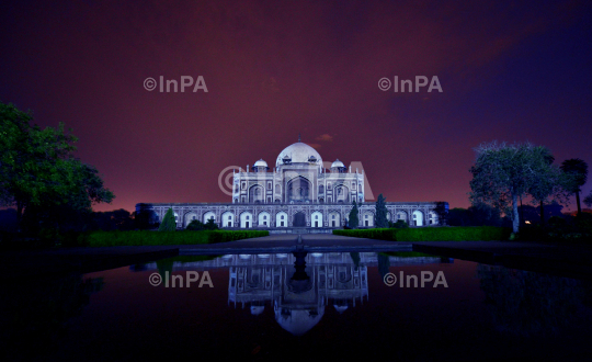 Humayun tomb being illuminated in blue