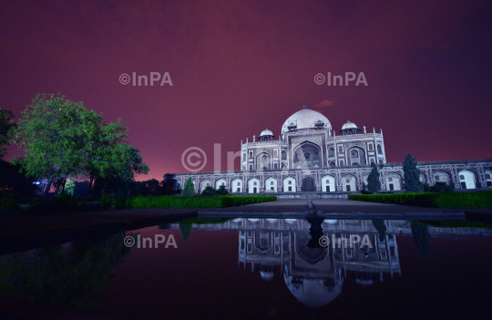 Humayun tomb being illuminated in blue