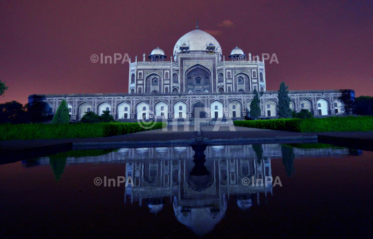 Humayun tomb being illuminated in blue