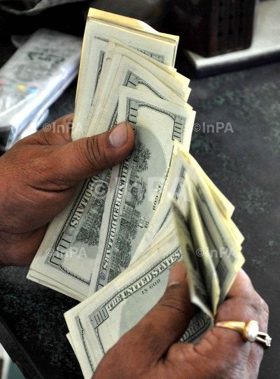 R u p e e   f a l l s   t o   r e c o r d   l o w   o f   6 4 . 1 3   p e r   D o l l a r .   T h e   I n d i a n   r u p e e   f a l l i n g   t o   a   r e c o r d   l o w   a n d   t h e   I n d o 